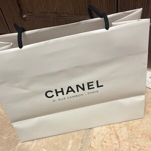 CHANEL Cream Shopping Bag with Black Handles